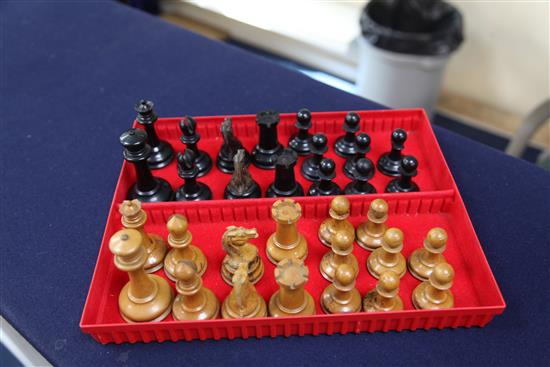 A Staunton ebony and boxwood chess set by Jaques of London, in carton pierre casket, (a.f.).